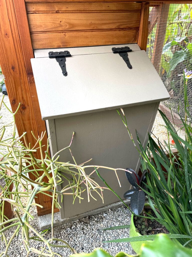 External chicken feeder box on a chicken coop built from plans
